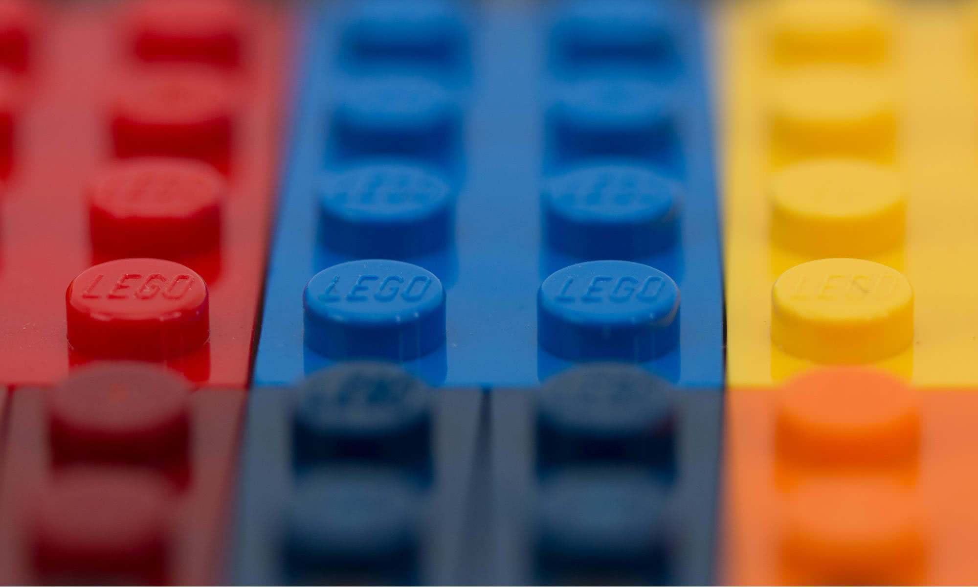 Close up photo of LEGO bricks in primary colors